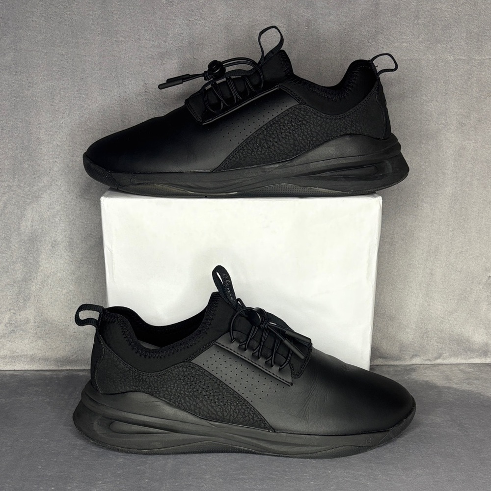 Black Streamlined Low-Top Sneakers with Mesh Upper